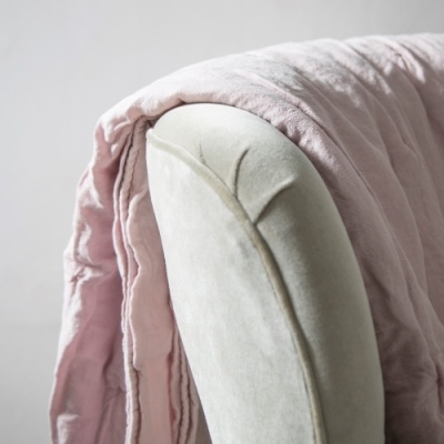 Pink linen quilt styled